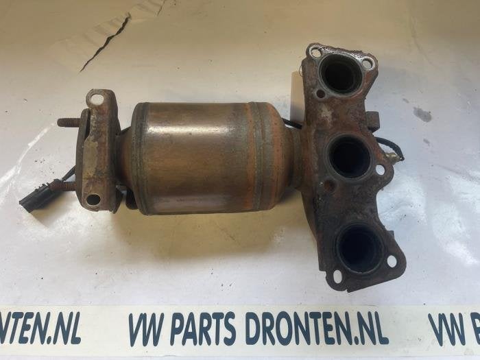 Uitlaatspruitstuk + katalysator van een Volkswagen Fox