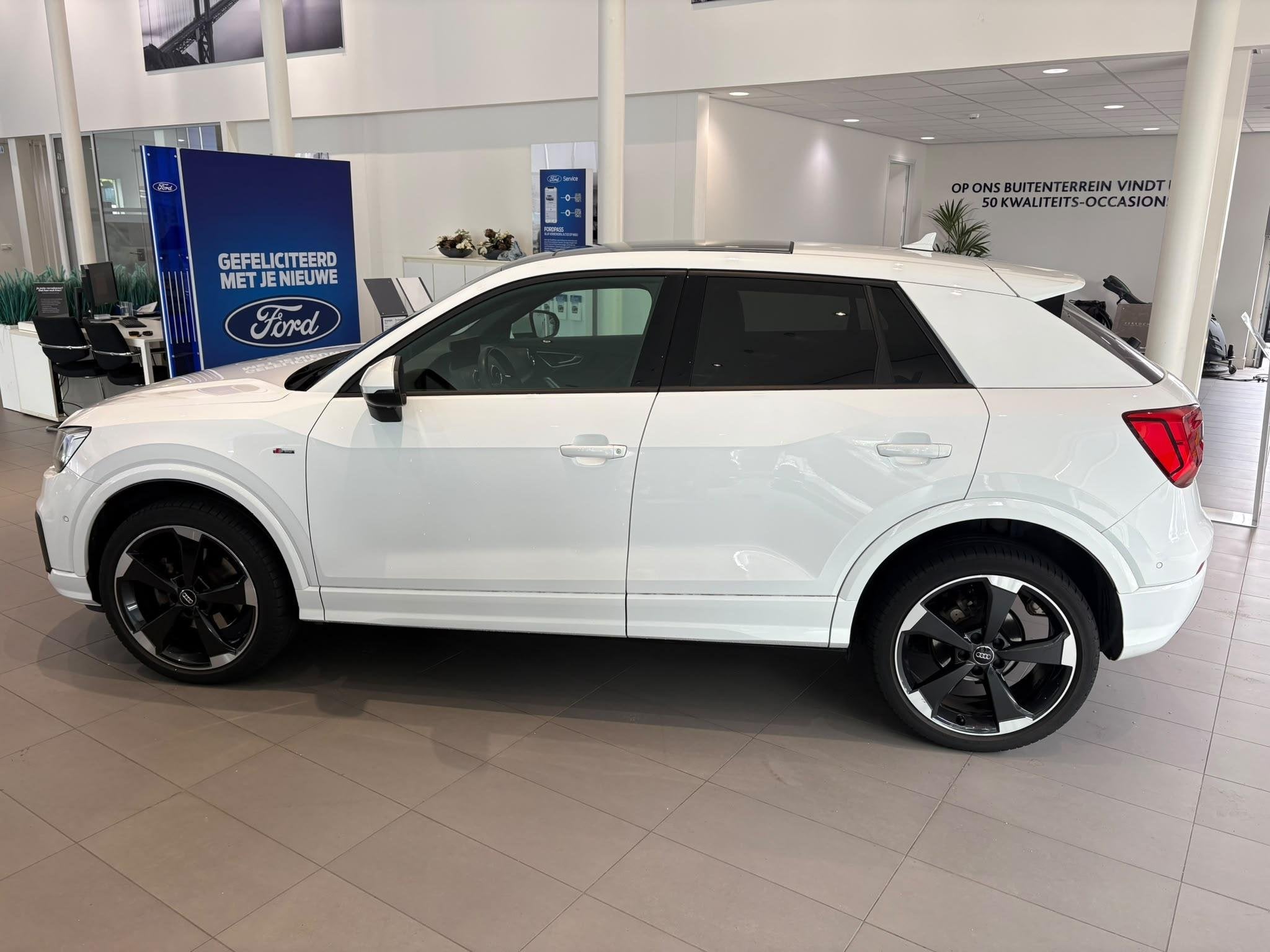Audi Q2 1.4 TFSI CoD Sport Edition #1 PANORAMA DAK | CAMERA, 12 maanden, Gebruikt, 4 cilinders, Wit