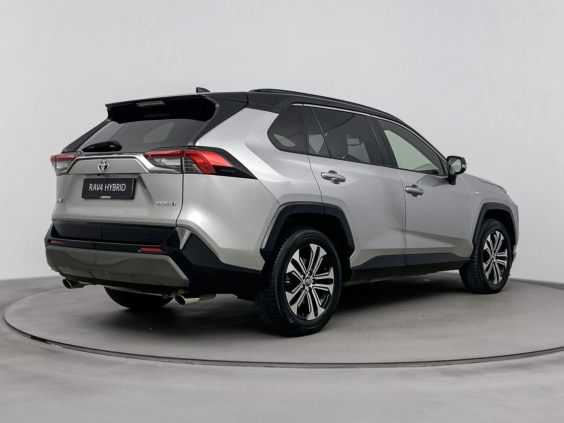 Toyota RAV4 2.5 Hybrid Bi-Tone | JBL-Audio | Navigatie | Par, Auto's, Gebruikt, 4 cilinders, Bedrijf, Automatische klimaatregeling