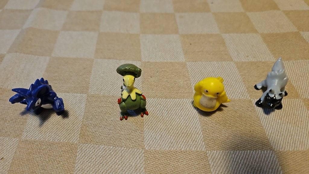 4 pokemon poppetjes Psyduck Breloom Poochyena mogen PS, Ophalen of Verzenden