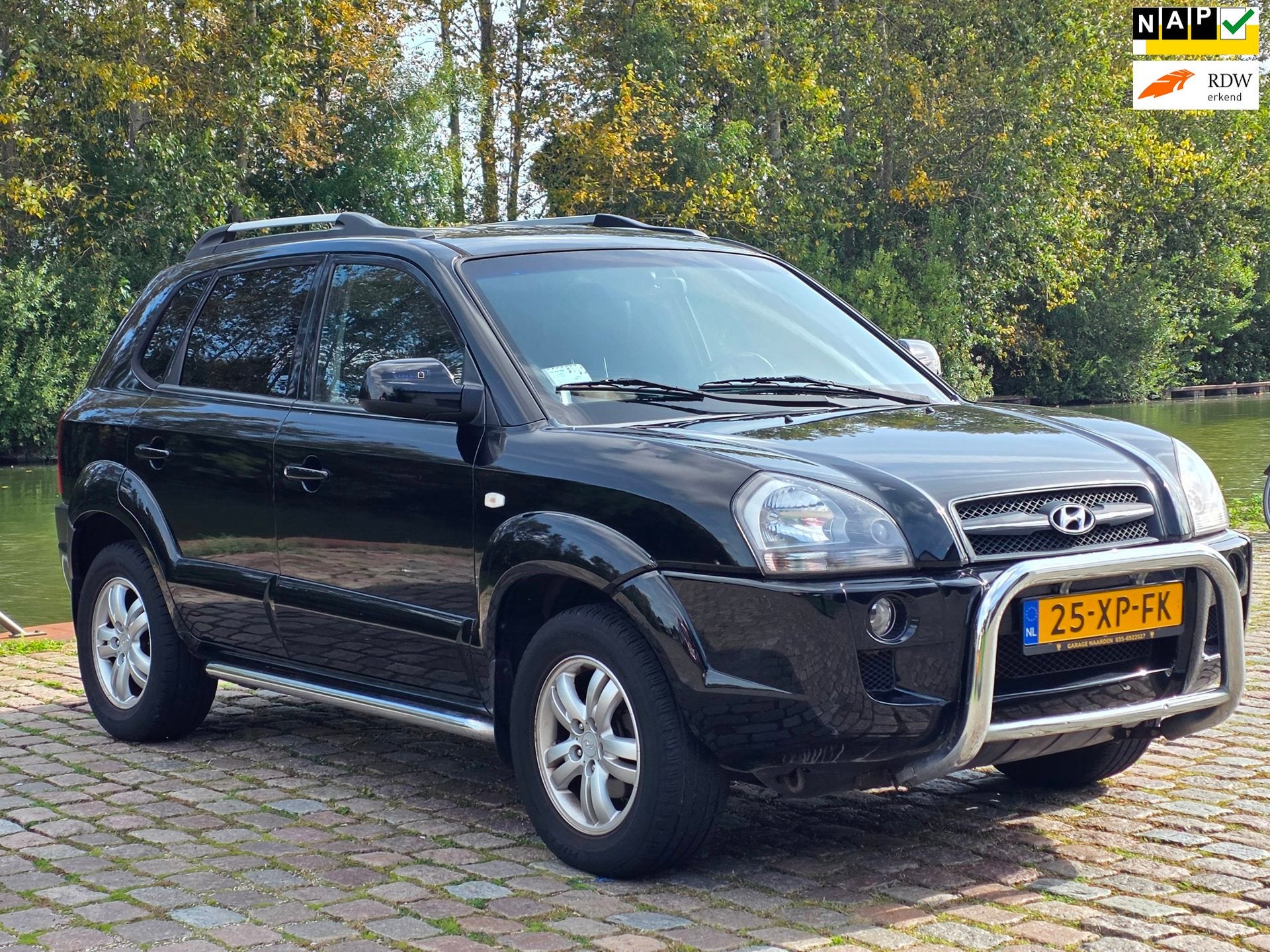 Hyundai Tucson 2.0i Style Premium, Auto's, Gebruikt, 4 cilinders, Zwart, Handgeschakeld