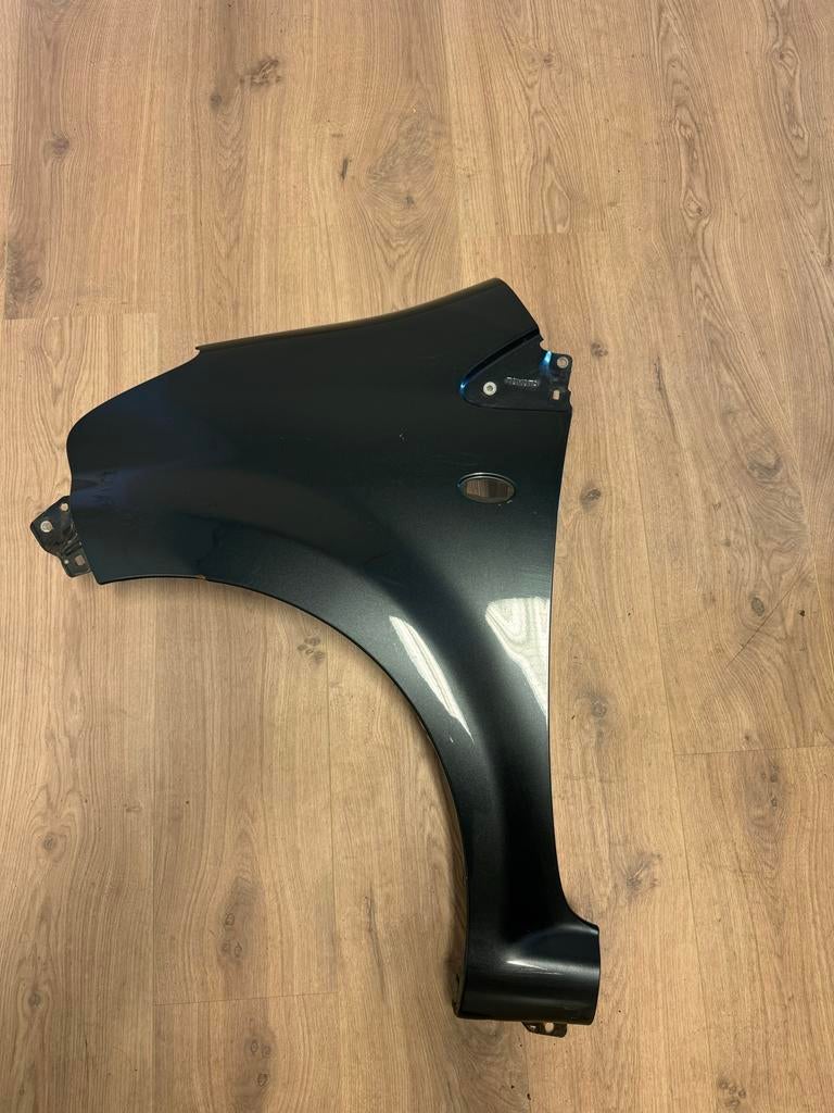 Toyota Aygo zijscherm spatscherm spatbord, Ophalen of Verzenden
