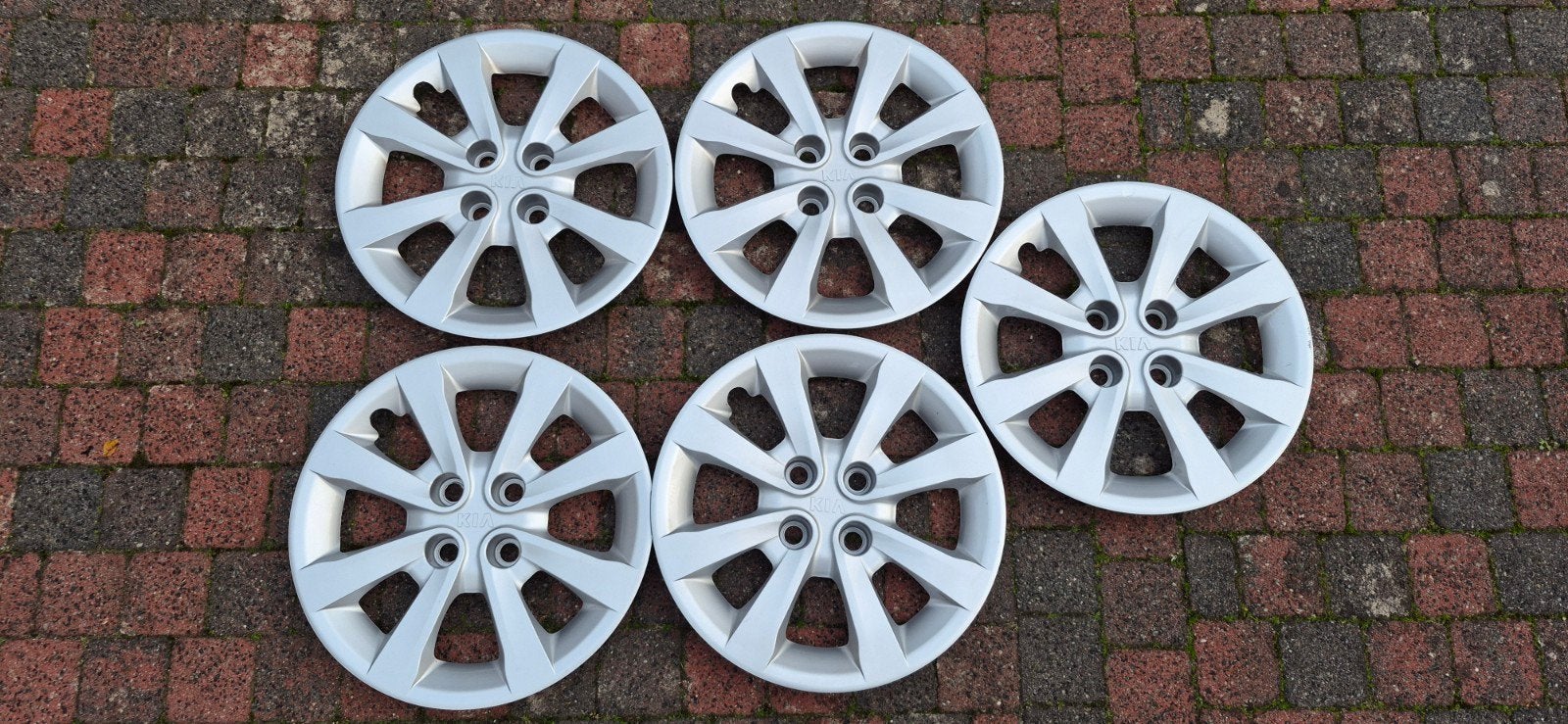 Kia wieldoppen 15 inch - Set van 4 (+1), Auto diversen, Ophalen of Verzenden, Gebruikt