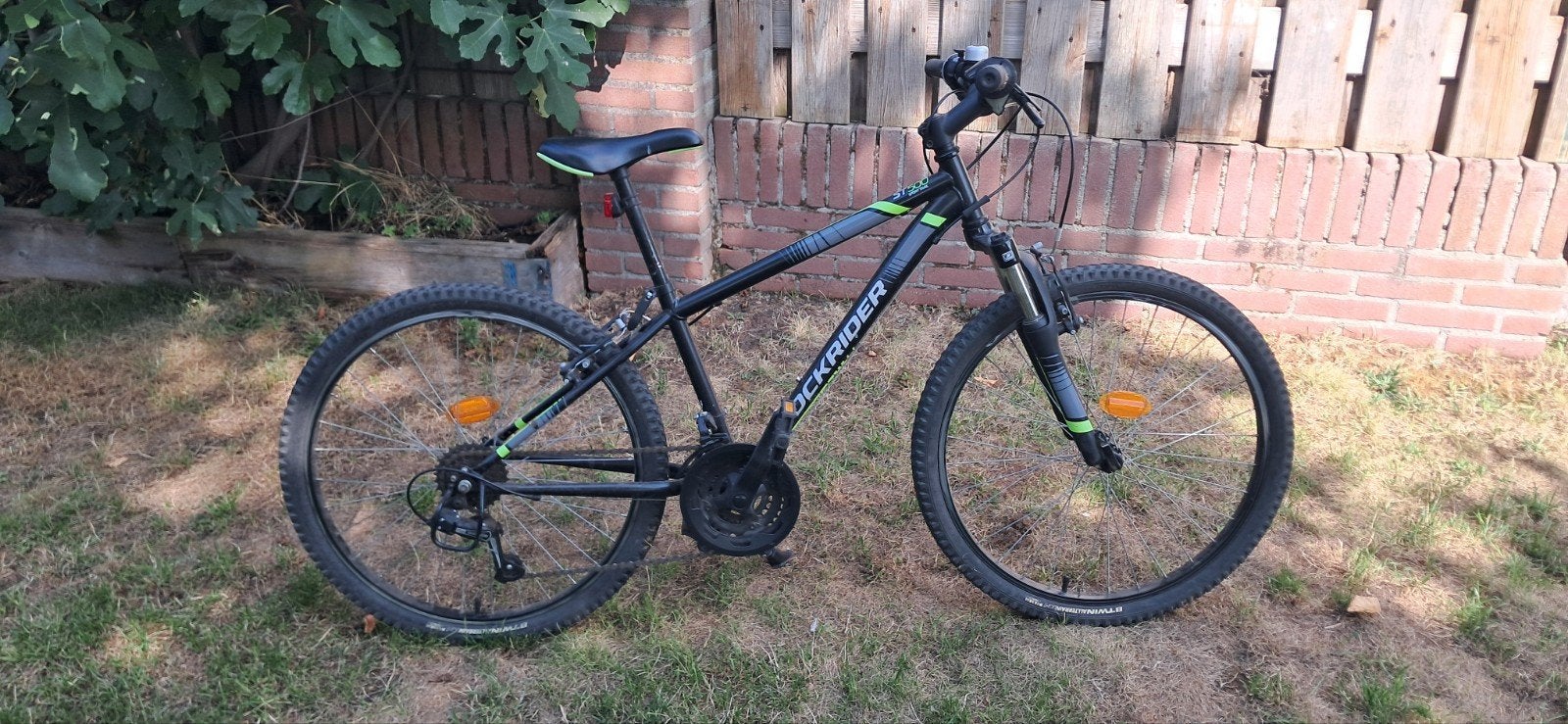 Rockrider ST100 Mountainbike - Zwart/Groen, Velgrem, 49 tot 53 cm, Zo goed als nieuw, Meer dan 20 versnellingen
