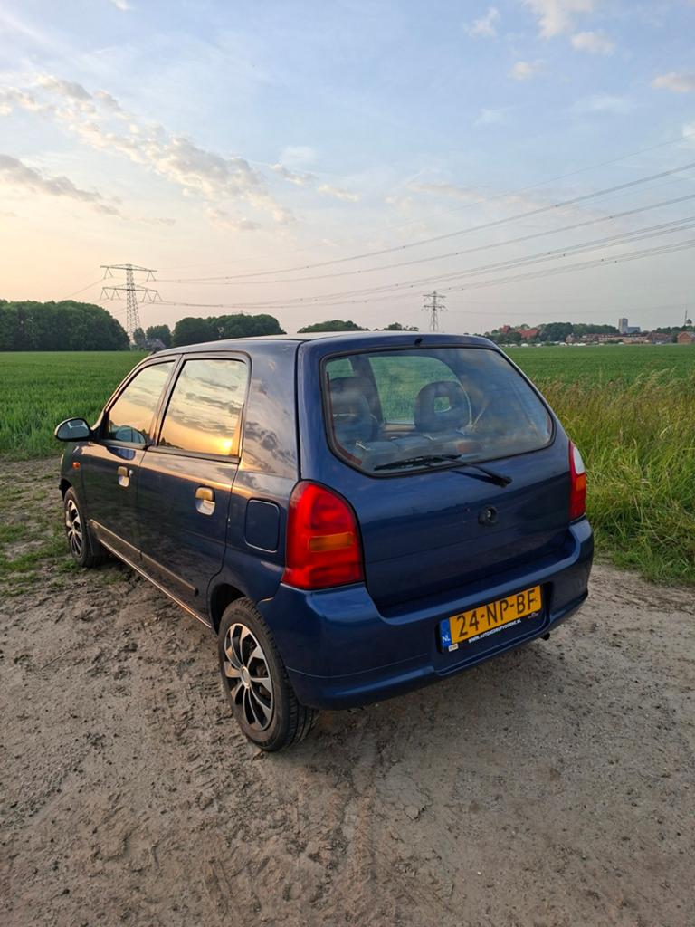Suzuki Alto 1.1 AUT 2004 Blauw, Auto's, Suzuki, Stof, 4 cilinders, Origineel Nederlands, Grijs