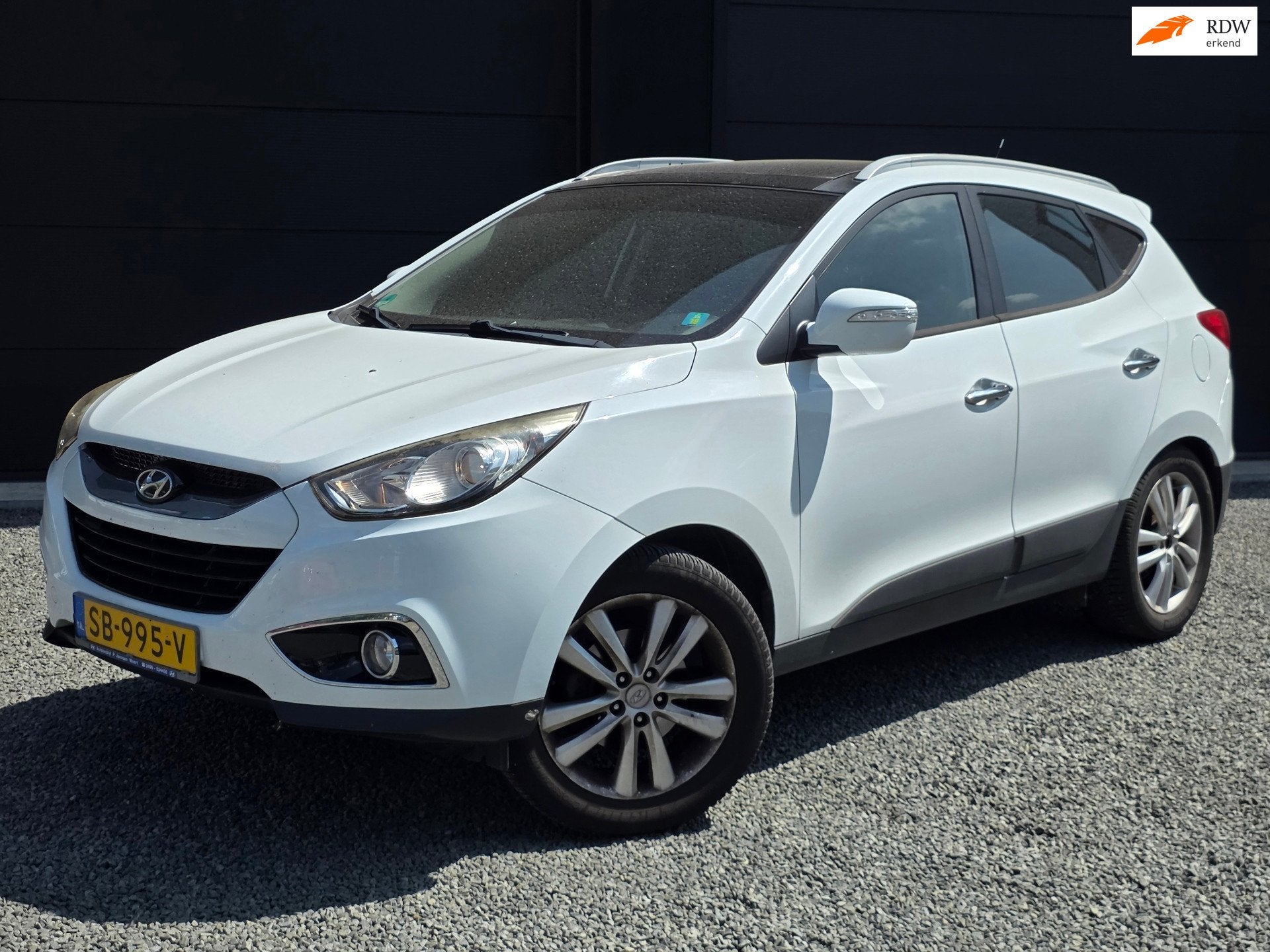 Hyundai Ix35 2.0i 4WD Full-Option | Onderhouden |, Auto's, Hyundai, Automaat, Gebruikt, Zwart, 4 cilinders