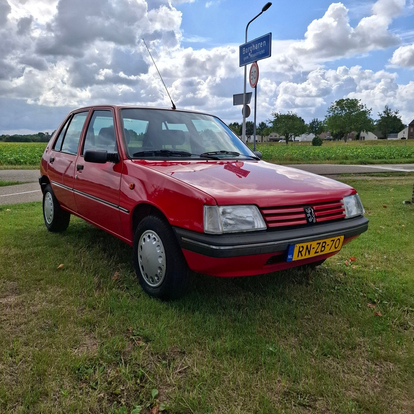 Zeer mooie 5 deurs Peugeot 205 - 1.4 - Generation 1997 Rood, Auto's, Voorwielaandrijving, Stof, Radio, 4 cilinders