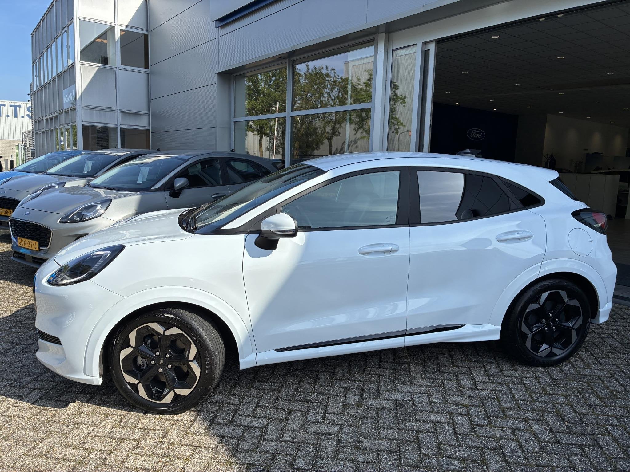 Ford Puma Gen-E Premium 44 kWh, Auto's, Ford, 12 maanden, 750 kg, Leder en Stof, Origineel Nederlands