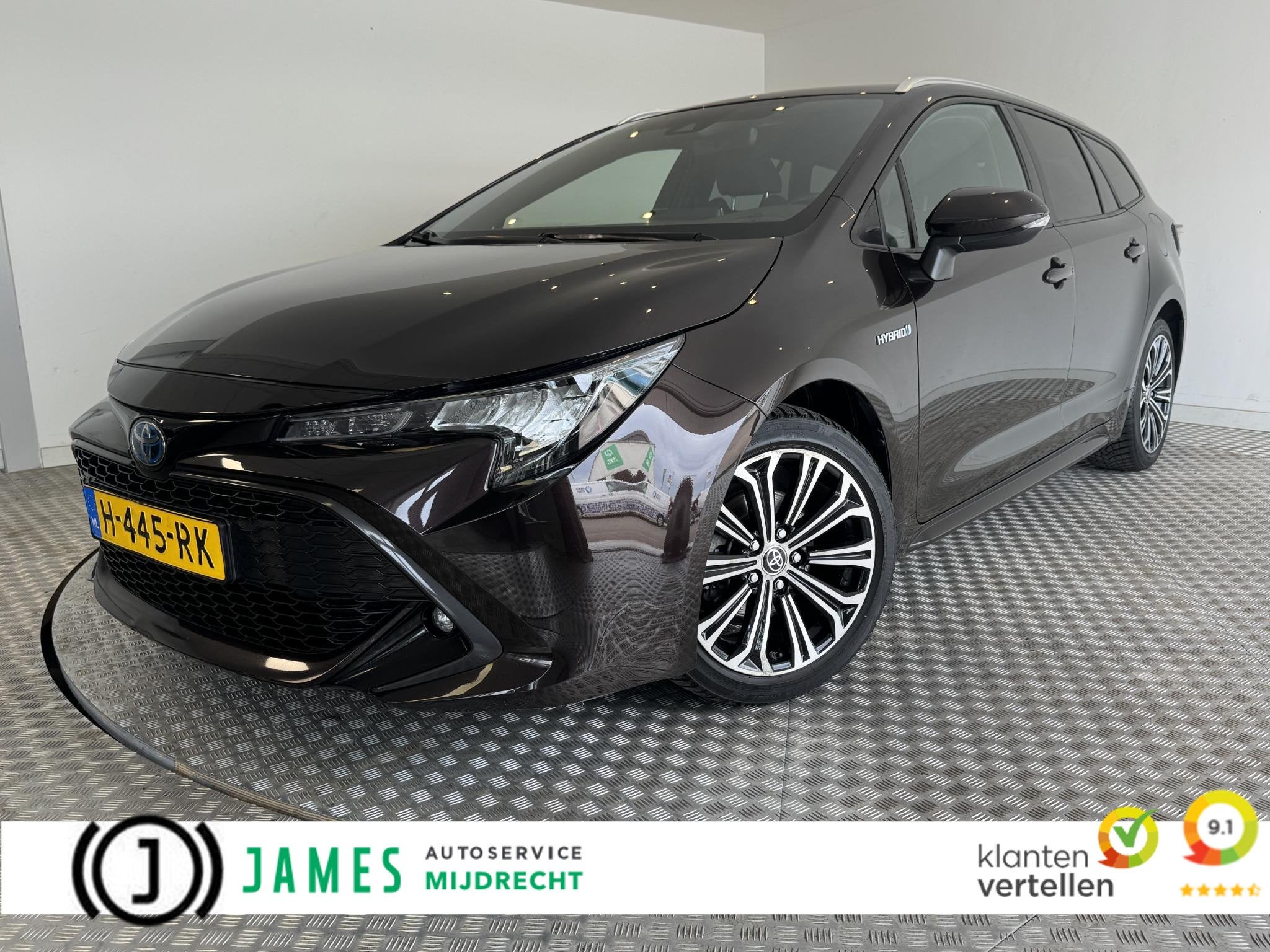 Toyota Corolla Touring Sports 1.8 Hybrid Business Plus, Auto's, Gebruikt, Bruin, Corolla, 122 pk
