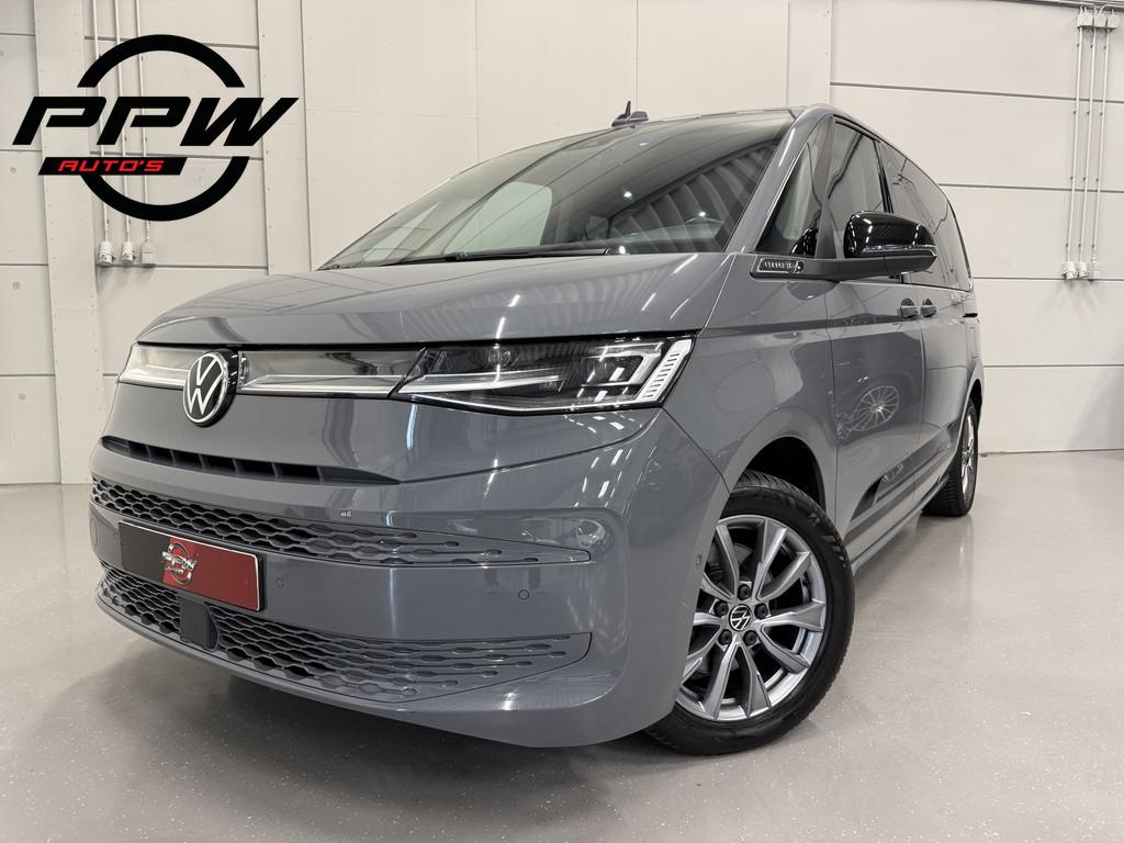 Volkswagen Multivan 1.4 eHybrid EDITION 7p. PANO/LEER/MASSAG, Auto's, Gebruikt, Zwart, Met garantie (alle), 7 stoelen