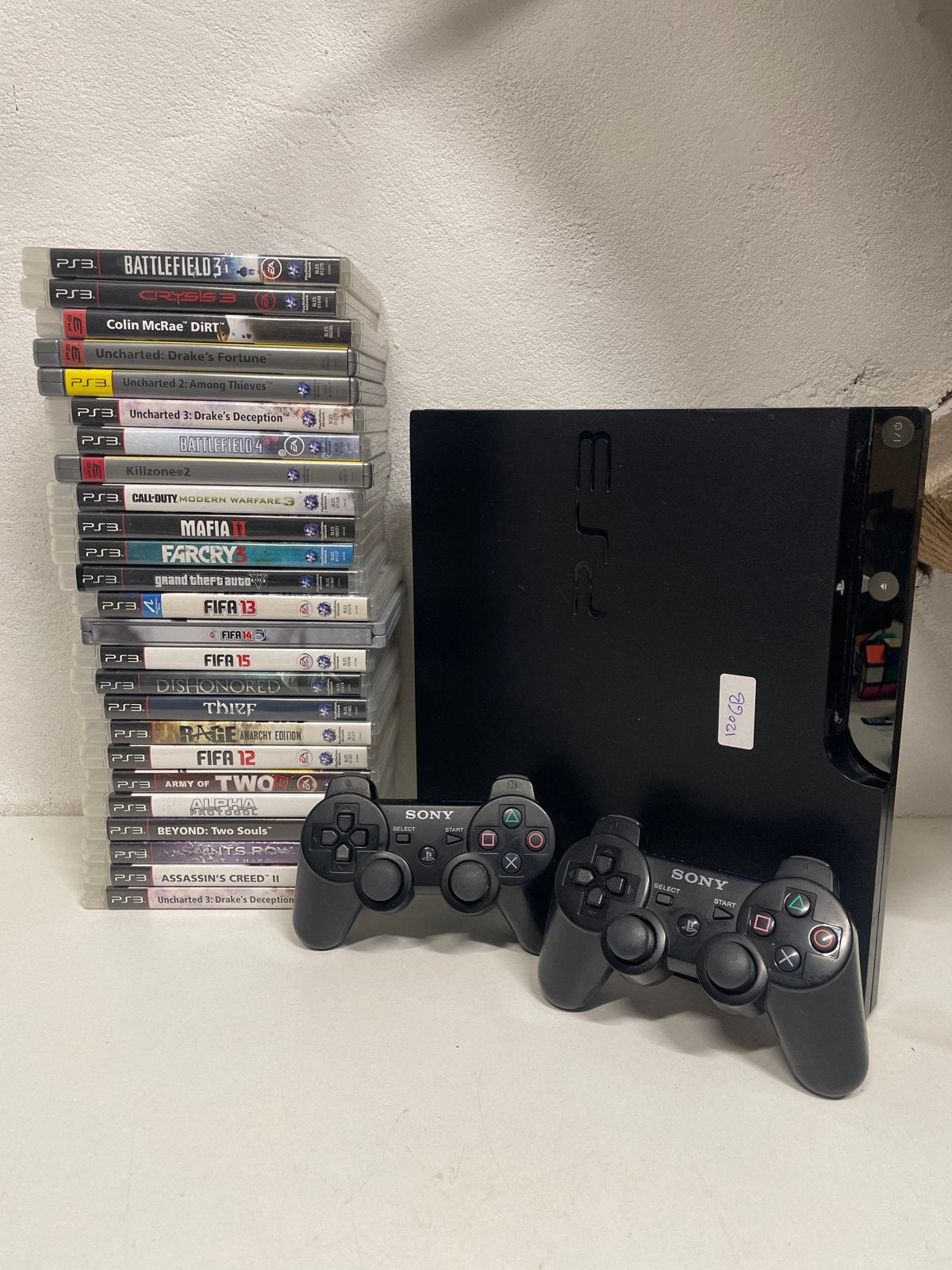 PS3 Slim 120GB met 2 controllers en 25 games, Spelcomputers en Games, Met 2 controllers, Ophalen of Verzenden, 120 GB, Slim