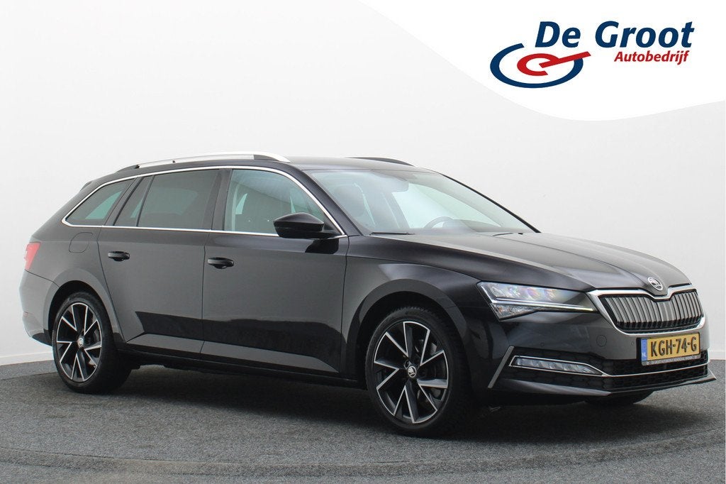 Skoda Superb Combi 1.4 TSI PHEV Sportline Business SOH 100%,, Auto's, Stof, Gebruikt, 4 cilinders, Parkeersensor