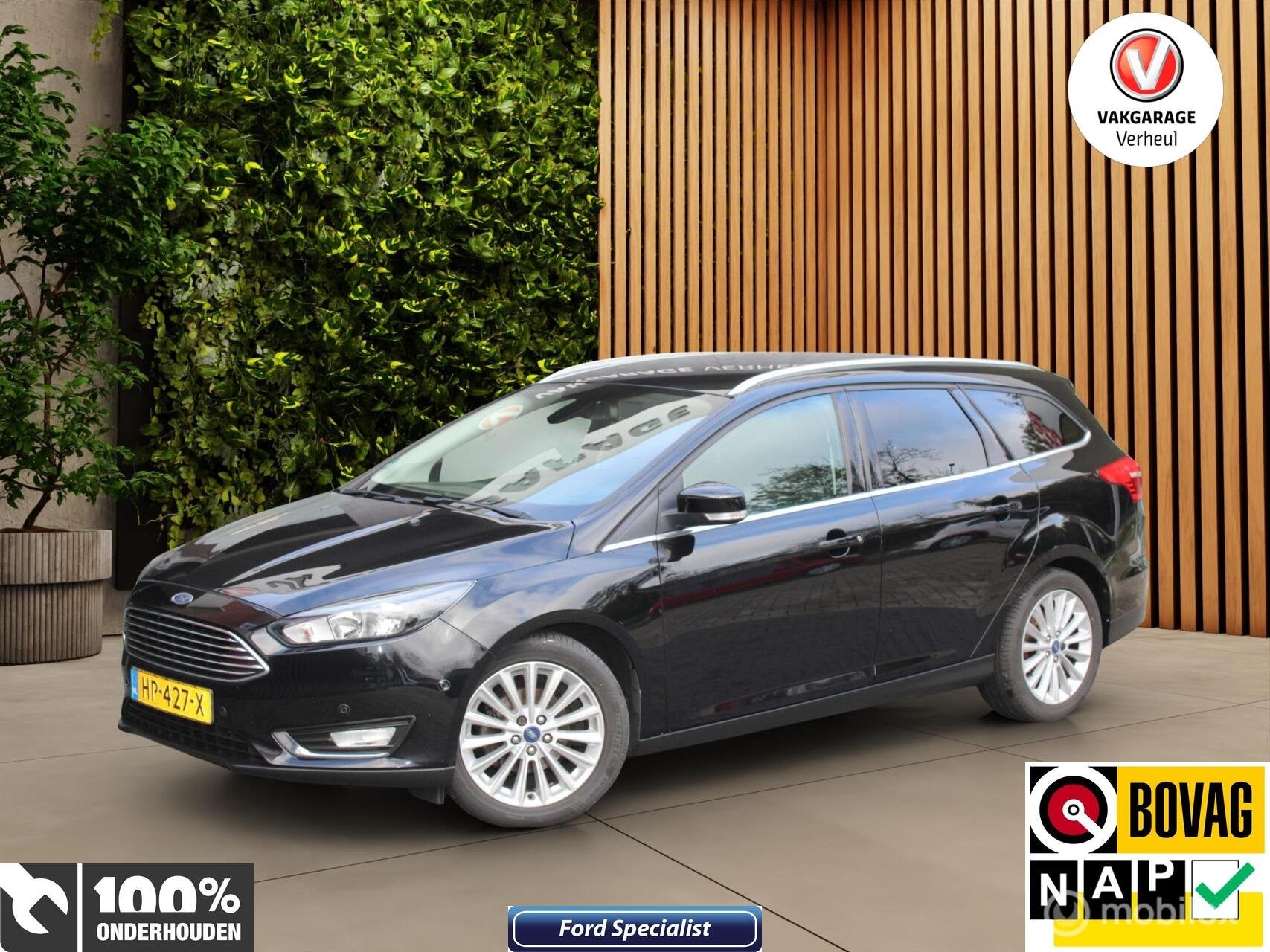 Ford Focus Wagon 1.0 TitaniumEdition|125Pk|Trekhaak|Navi|Nap, Auto's, Gebruikt, Zwart, Origineel Nederlands, Handgeschakeld