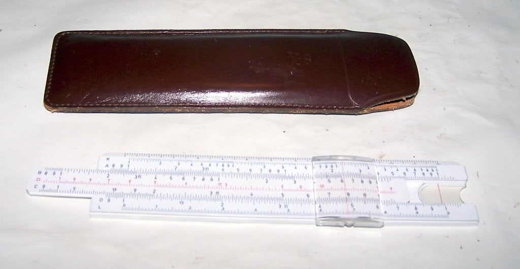 Zeldzame UTO 601 pocket rekenlineaal met etui. Nwst., Antiek en Kunst, Antiek | Gereedschap en Instrumenten, Ophalen of Verzenden