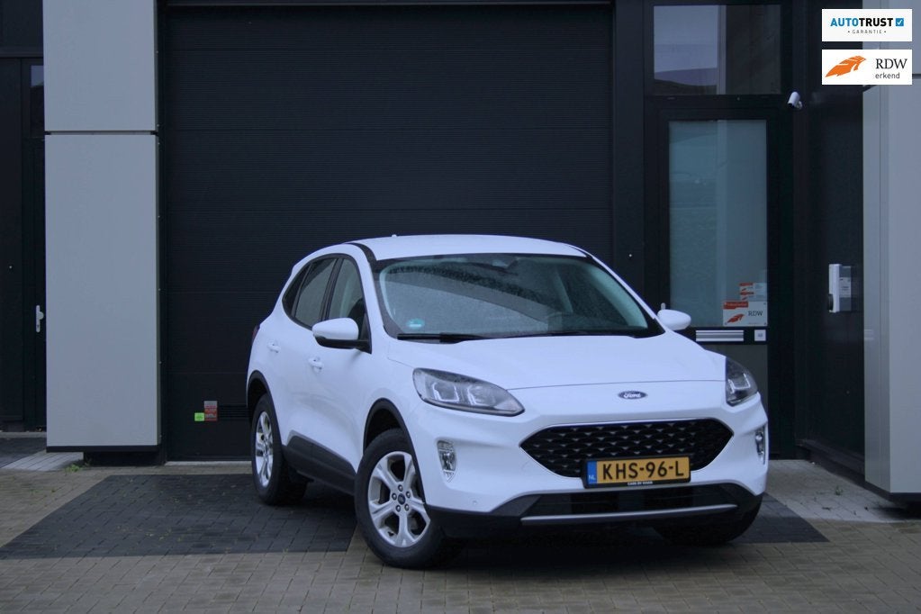 Ford Kuga 2.5 PHEV - 225PK - Automaat - APK 2028 - Carplay -, Auto's, Stof, Gebruikt, 4 cilinders, Wit