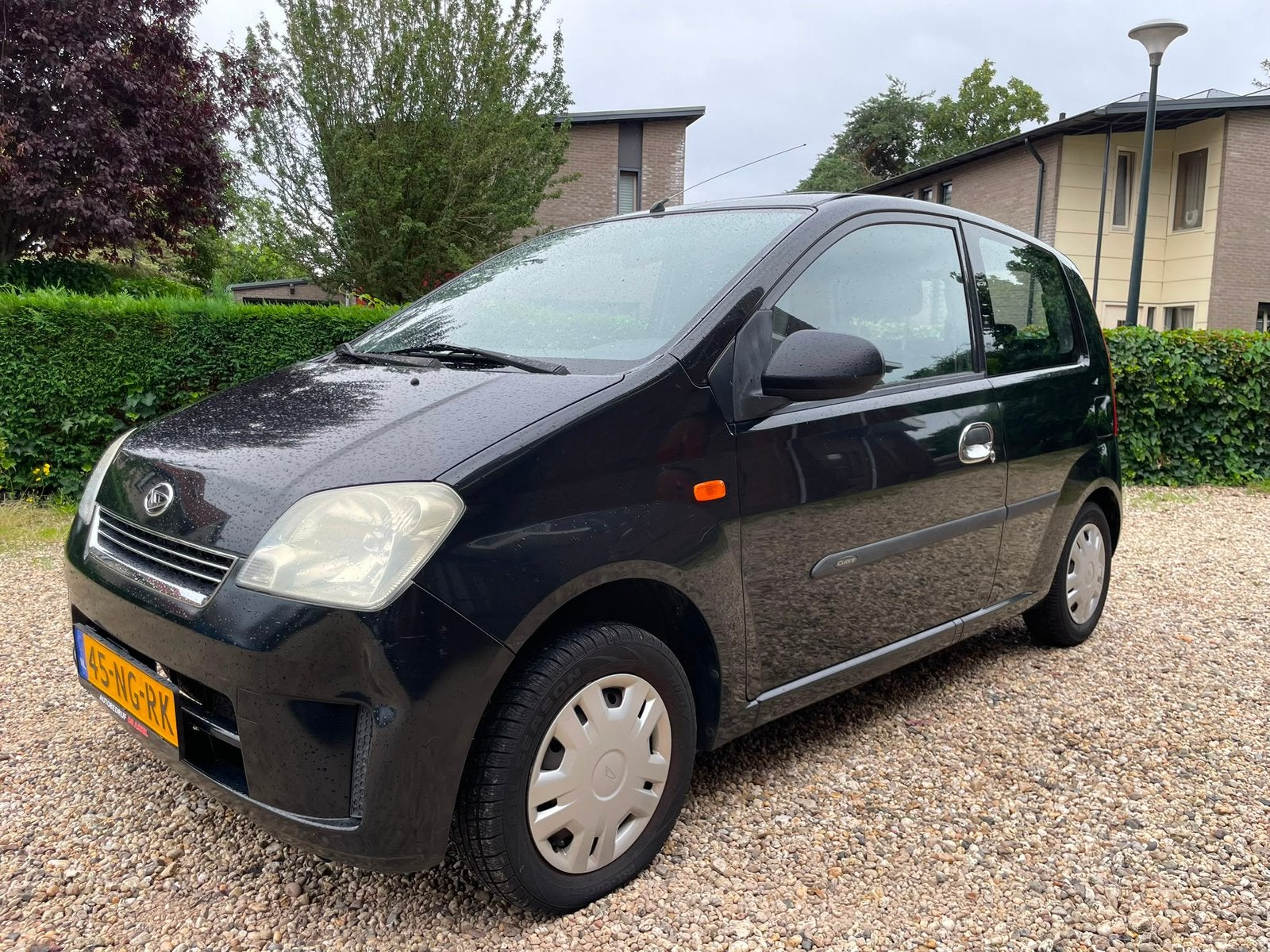 Daihatsu Cuore 1.0 3D 2003 Zwart, Auto's, Stof, 600 kg, Zwart, 18 €/maand