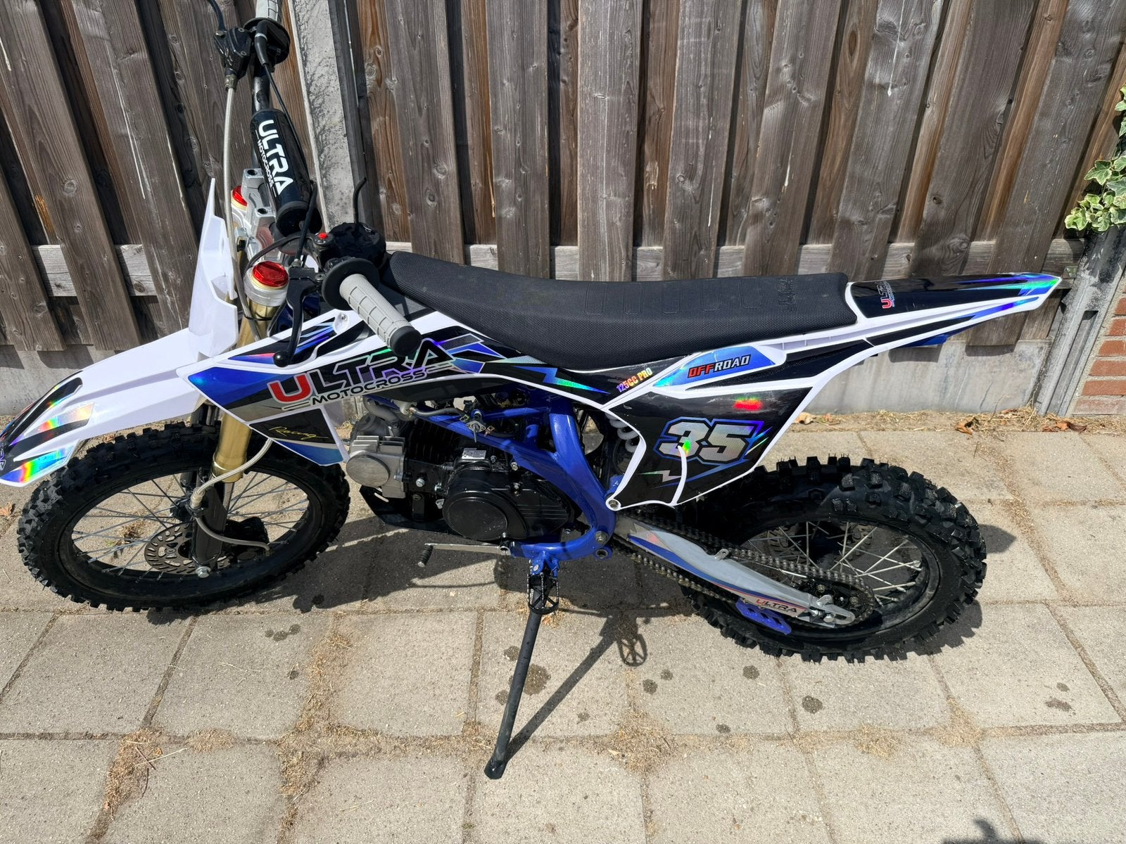 Ultra Motocross 125cc Pro in blauw/wit/zwart, Ophalen, Zo goed als nieuw, Overige merken