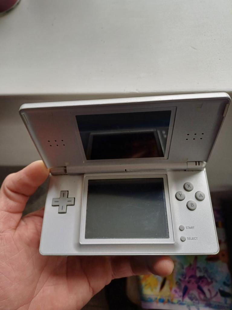 Nintendo ds lite, Spelcomputers en Games, Spelcomputers | Nintendo DS, Ophalen of Verzenden, Zo goed als nieuw, Zwart, DS Lite