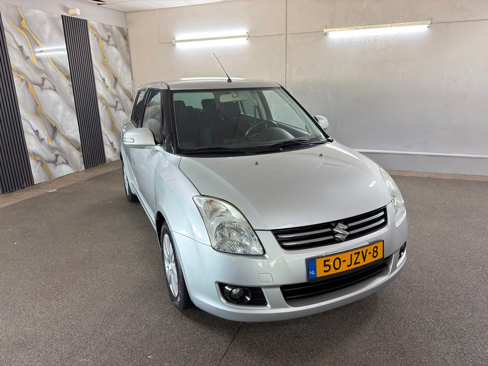 Suzuki Swift 1.3 Limited,Airco,Stoelverwarming,Carplay,E-Ram, Auto's, Voorwielaandrijving, Zwart, Alcantara, Swift