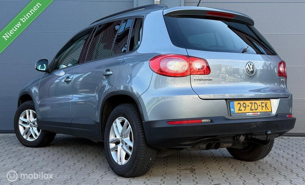 Volkswagen Tiguan 1.4 TSI Trend&Fun 4Motion Trekhaak/Clima/E, Gebruikt, 4 cilinders, Origineel Nederlands, Bedrijf