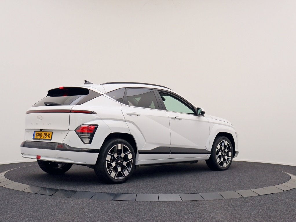 Hyundai KONA Electric Comfort Smart 65.4 kWh | Demo | Stoelv, Auto's, Gebruikt, Wit, Kona, 300 kg