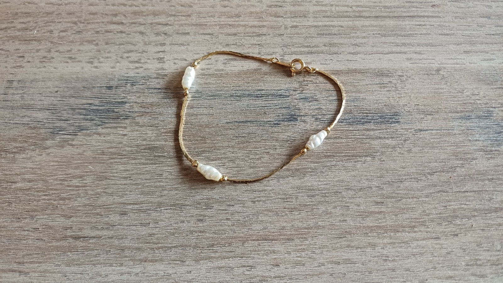 Gouden armband met parels, Ophalen of Verzenden, Gebruikt, Goud, Met bedels of kralen