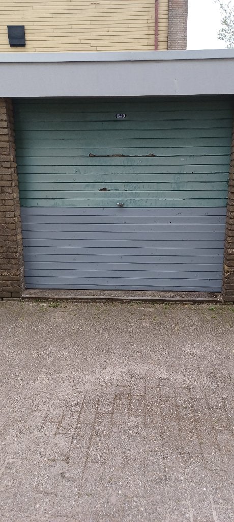 Gezocht schilder voor garage deur, Buitenschilderwerk