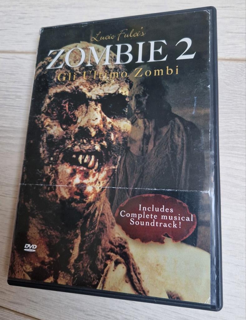 dvd zombie 2 lucio fulci's gli ultimo zombi met soundtrack, Cd's en Dvd's, Dvd's | Horror, Alle leeftijden, Ophalen of Verzenden