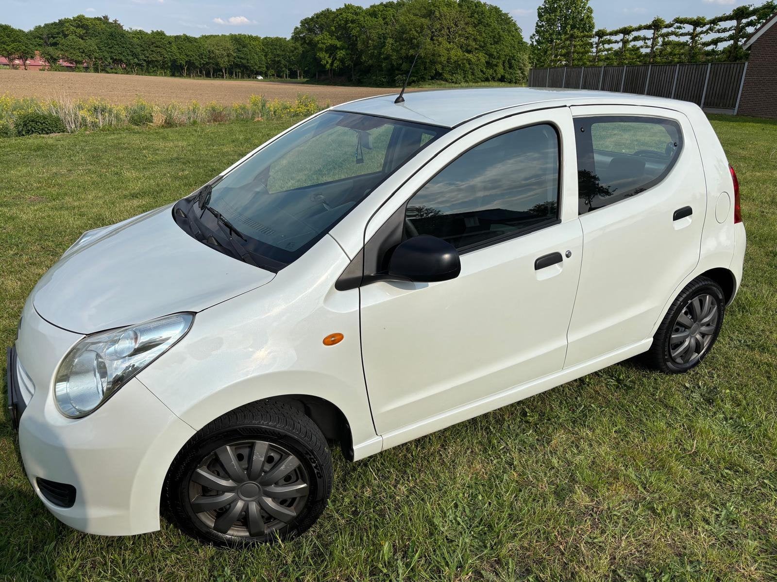 Suzuki Alto 1.0 2011 Wit Parelmoer AIRCO & APK!, Auto's, Voorwielaandrijving, Stof, 4 stoelen, Origineel Nederlands