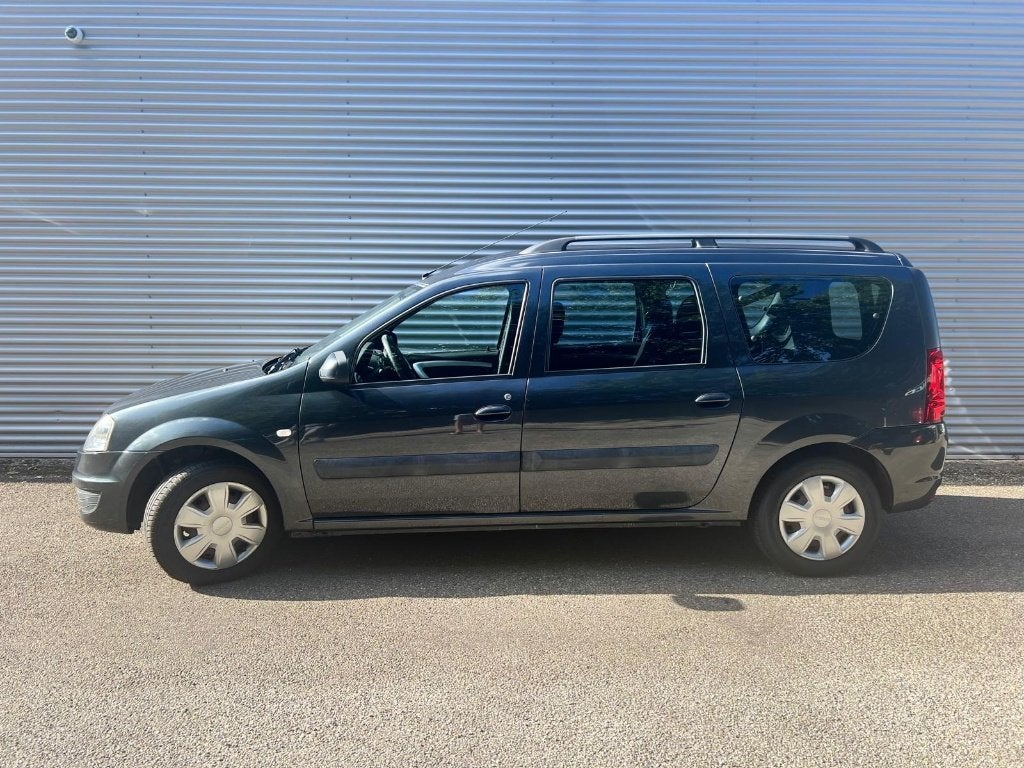 Dacia Logan 1.6 16V MCV 77KW 7P 2009 Grijs, Auto's, Radio, Stof, 7 stoelen, Logan