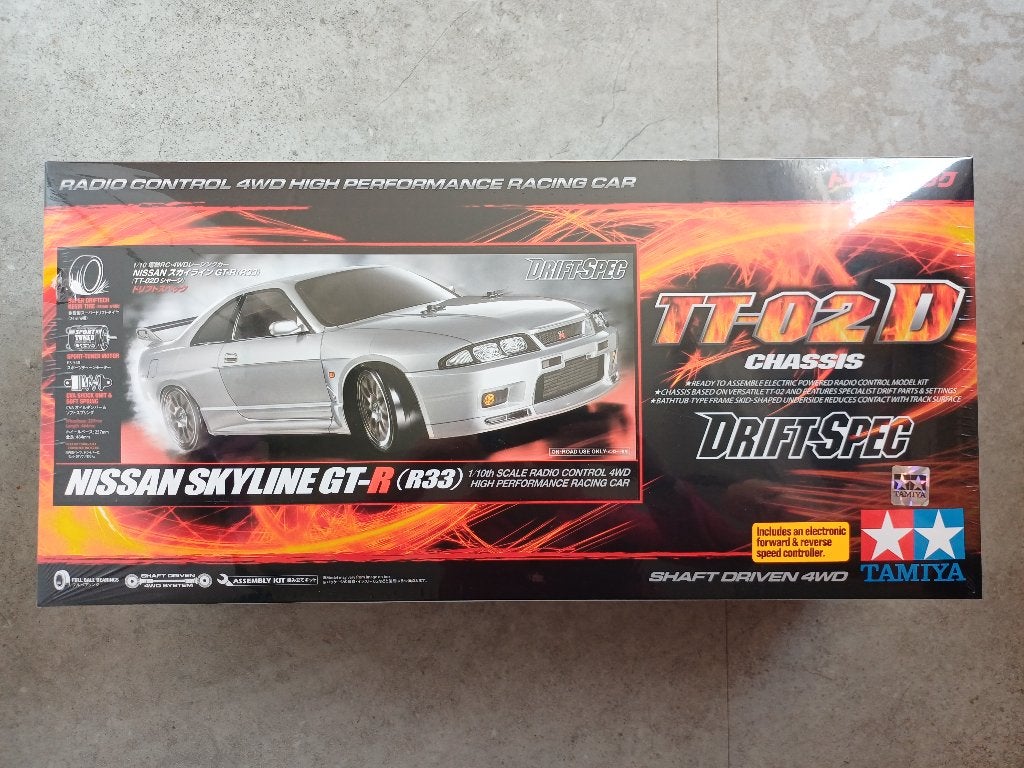 Tamiya 58604 RC Nissan Skyline GT-R (R33) TT-02D Nieuw, Hobby en Vrije tijd, Modelbouw | Radiografisch | Auto's, Elektro, Nieuw