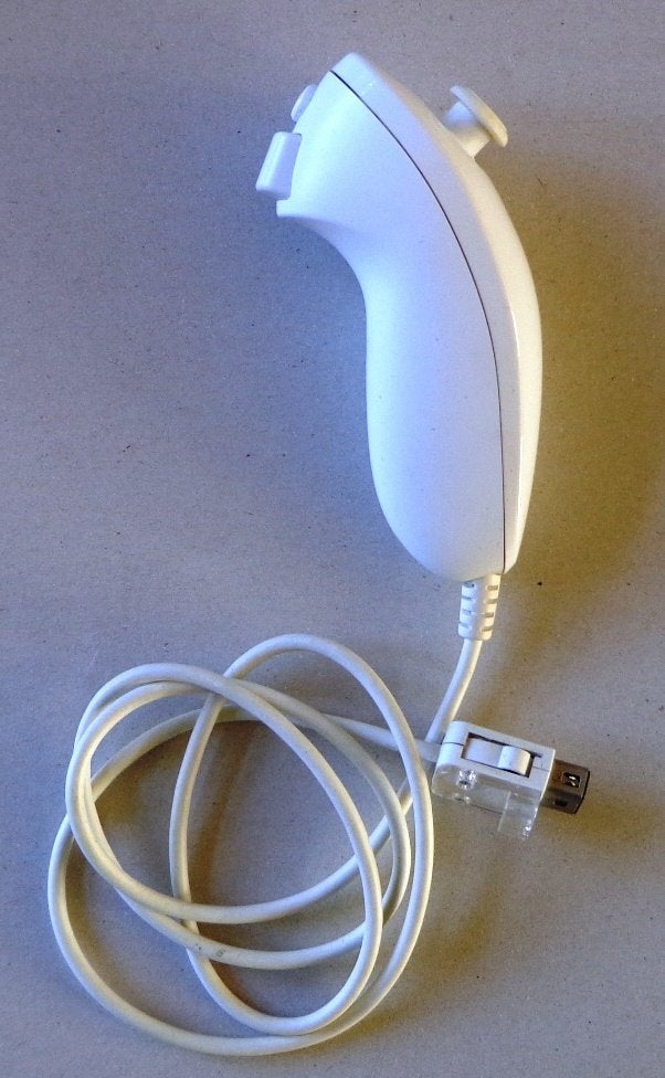 Originele Nunchuck Controller voor de Nintendo Wii Wit, Ophalen of Verzenden, Zo goed als nieuw, Met 3 controllers of meer