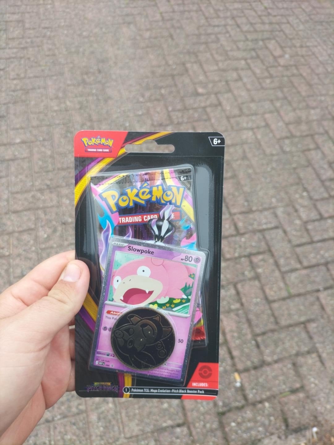 Pokémon TCG: Slowpoke blister met booster en munt, Ophalen of Verzenden, Nieuw