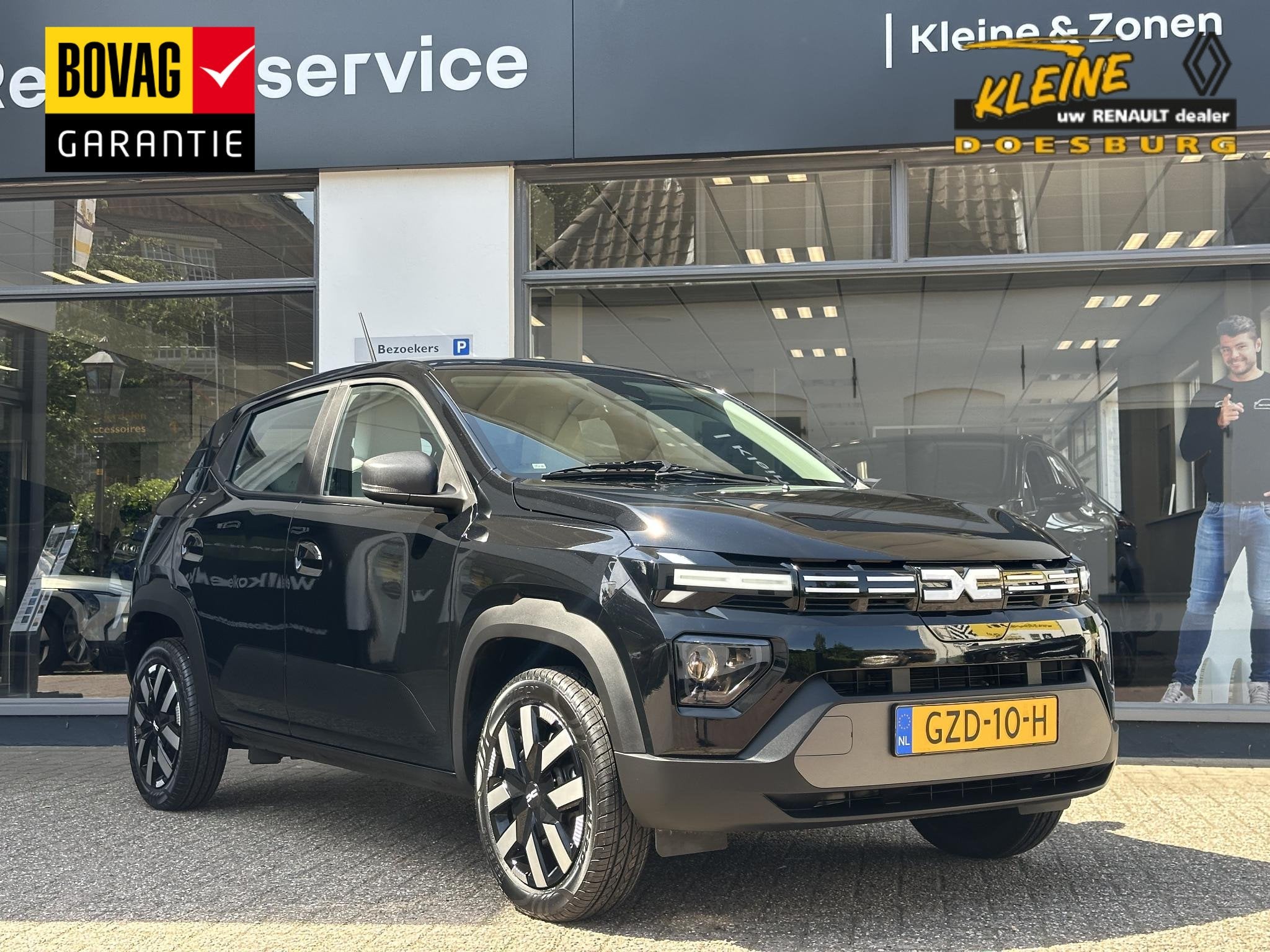 Dacia Spring Expression 65 26.8 kWh | DC lader met een maxim, Auto's, Stof, Gebruikt, 4 stoelen, Zwart