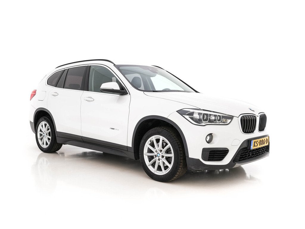 BMW X1 sDrive16d Centennial High Executive *LEATHER | NAVI-F, Auto's, BMW, Gebruikt, 116 pk, Wit, Bedrijf