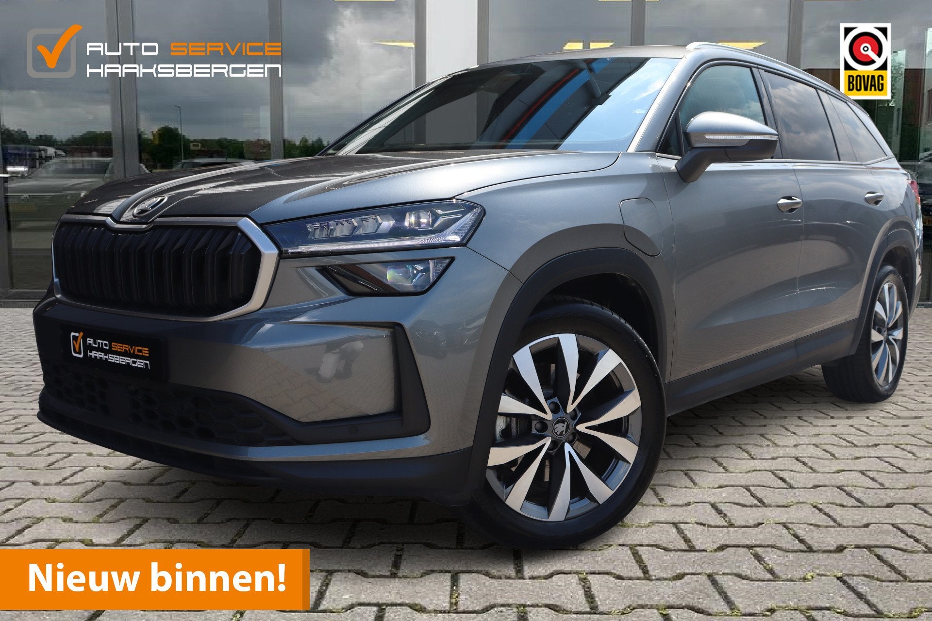 Skoda Kodiaq 1.5 TSI PHEV 204 PK Business Edition | Pano | T, Auto's, Skoda, Stof, Zwart, 4 cilinders, 26 kWh