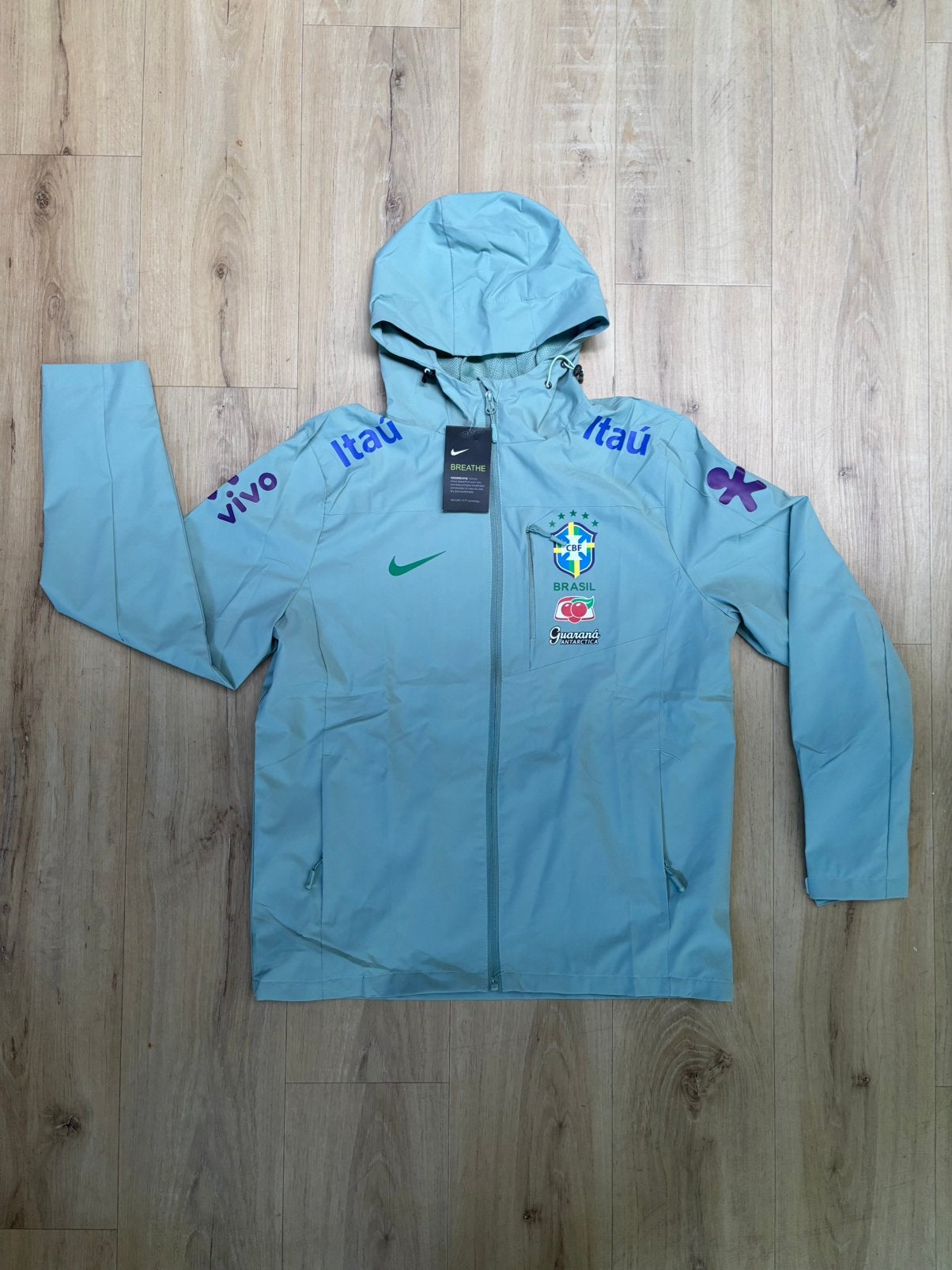 Brazilië Regenjas / Windbreaker - Maat L - Nieuw!, Maat 52/54 (L), Blauw, Nieuw, Ophalen of Verzenden