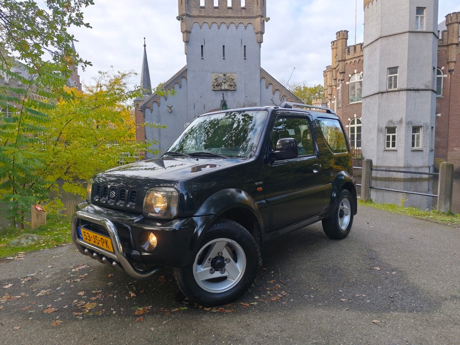 Suzuki Jimny 1.3 4x4 , special / airco / zeer mooi !! NAP!!, Auto's, 13 km/l, Stof, 40 €/maand, Zwart