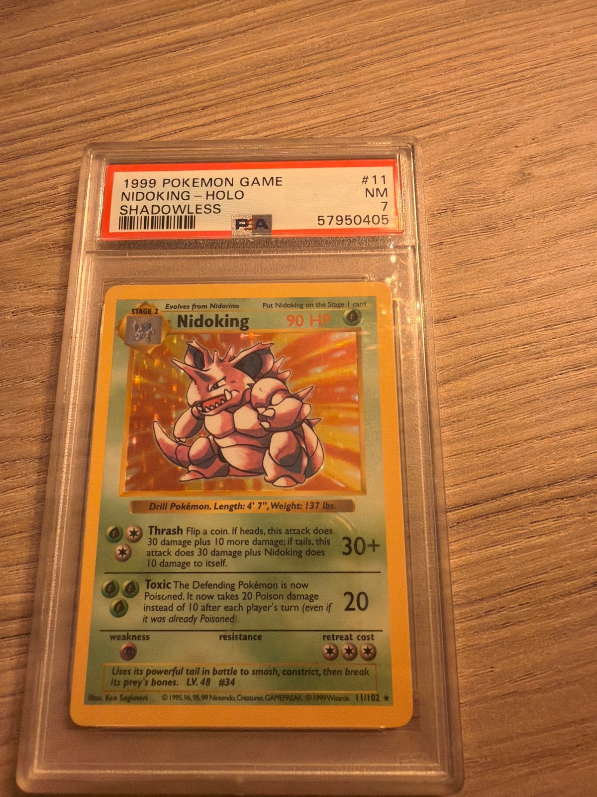 Nidoking Holo Shadowless PSA 7 Pokémon Kaart (1999), Ophalen of Verzenden, Zo goed als nieuw, Losse kaart