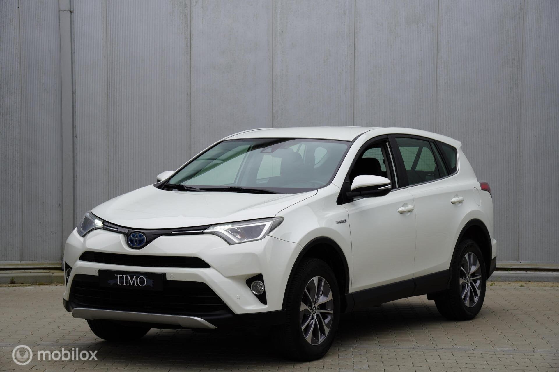 Toyota RAV4 2.5 Hybrid Dynamic 104.011 KM, Gebruikt, Wit, Bedrijf, Hybride Elektrisch/Benzine