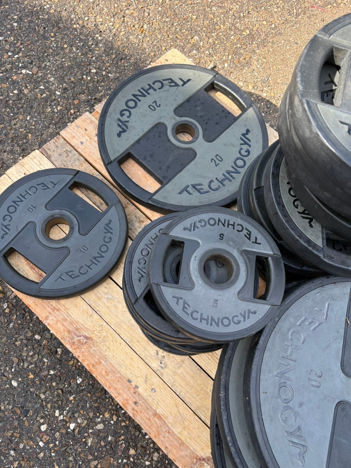 1000 kg technogym pu urethane olympische halter schijven, Sport en Fitness, Halterschijven, Pu urethane, Gebruikt, Technogym