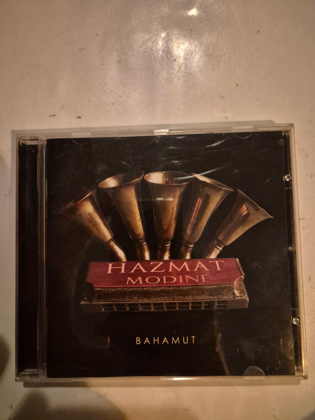 Hazmat Modini - Bahamut. Cd. 2007
Code 4006180428326

4 STUK, Ophalen of Verzenden, Gebruikt