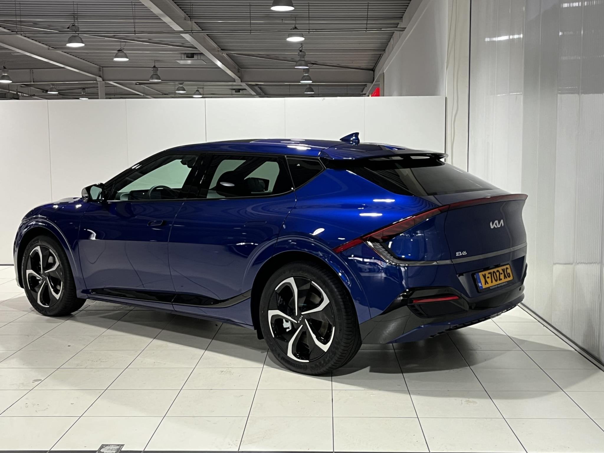 Kia EV6 GT-Line AWD 77.4 kWh 325PK, 360° Camera, Stoel en S, Auto's, Automaat, Gebruikt, Blauw, Origineel Nederlands