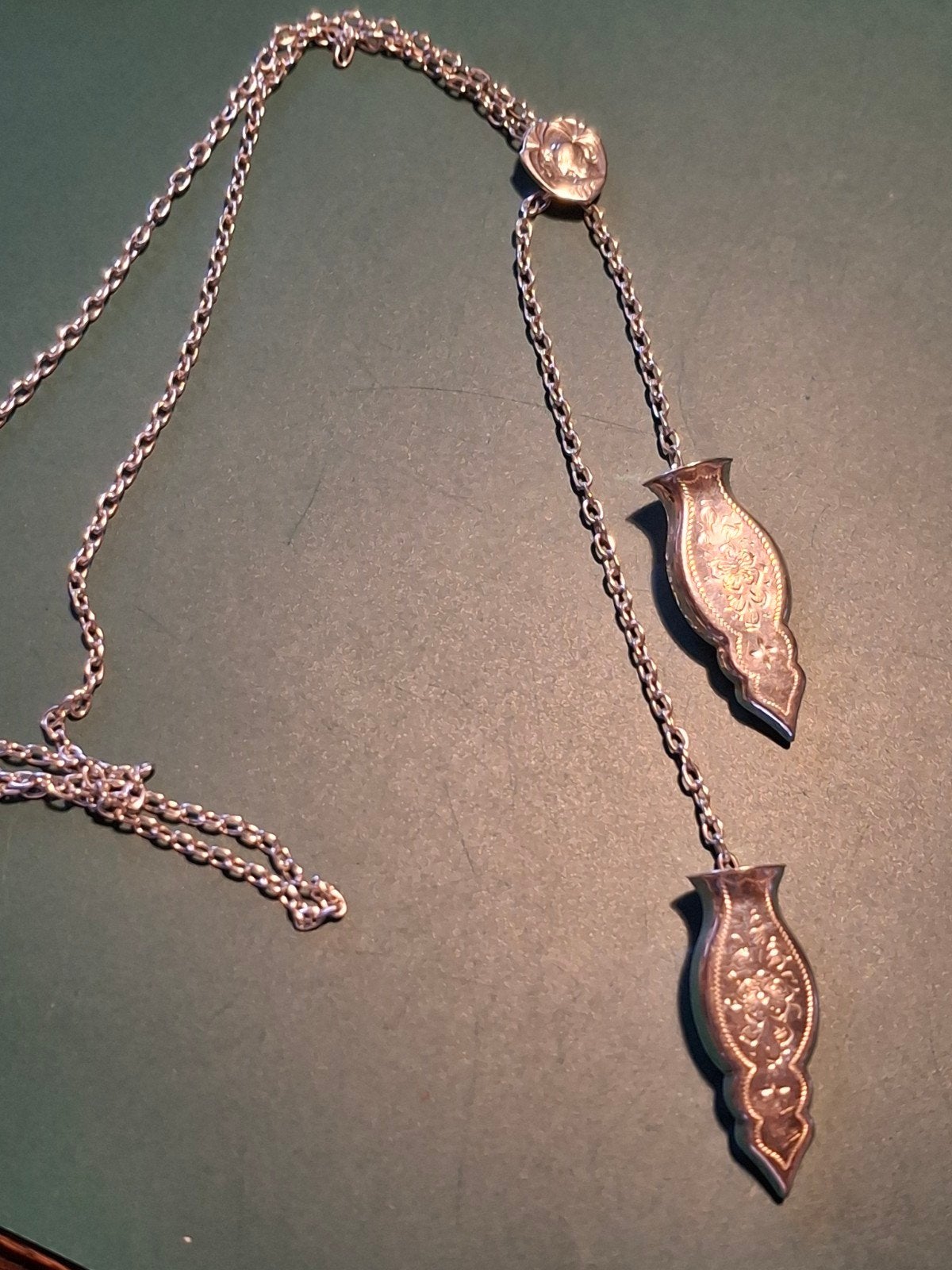 Zilveren ketting met  breipendoppen  zwaar, Ophalen