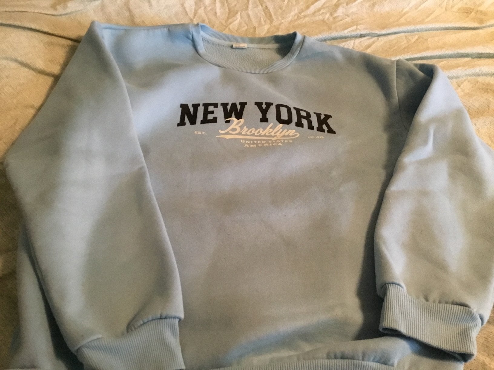 SWeater lichtblauw met opdruk maat M is 40-42, Ophalen of Verzenden, Zo goed als nieuw, Maat 42/44 (L), Blauw
