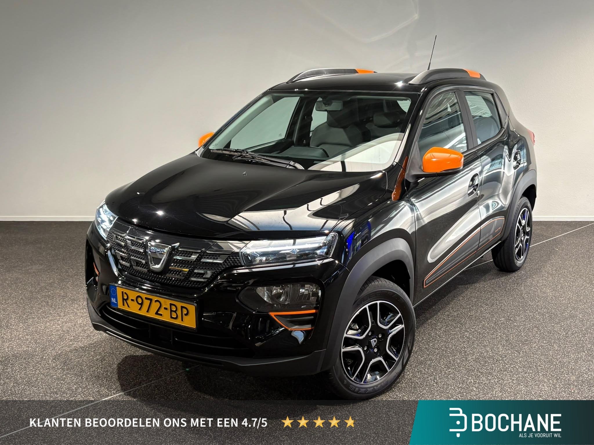 Dacia Spring Comfort Plus 27 kWh | Navigatie | Airco | Camer, Auto's, Gebruikt, Huisgarantie, Parkeercamera, Met garantie (alle)