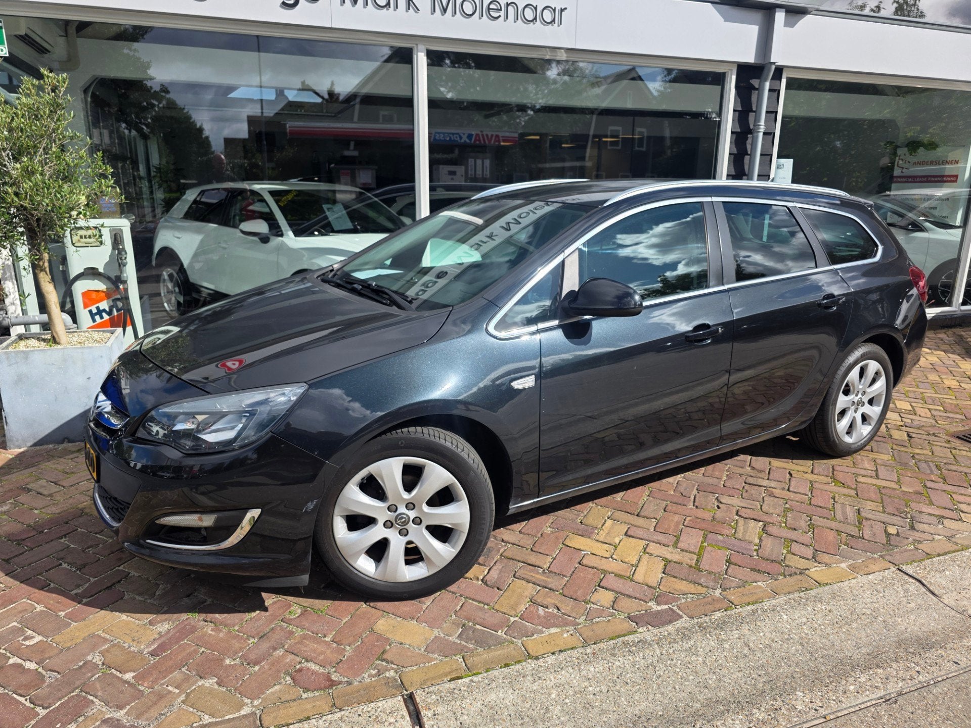 Opel Astra Sports Tourer 1.4 Turbo Cosmo,trekhaak, Auto's, Voorwielaandrijving, Euro 5, Gebruikt, 4 cilinders