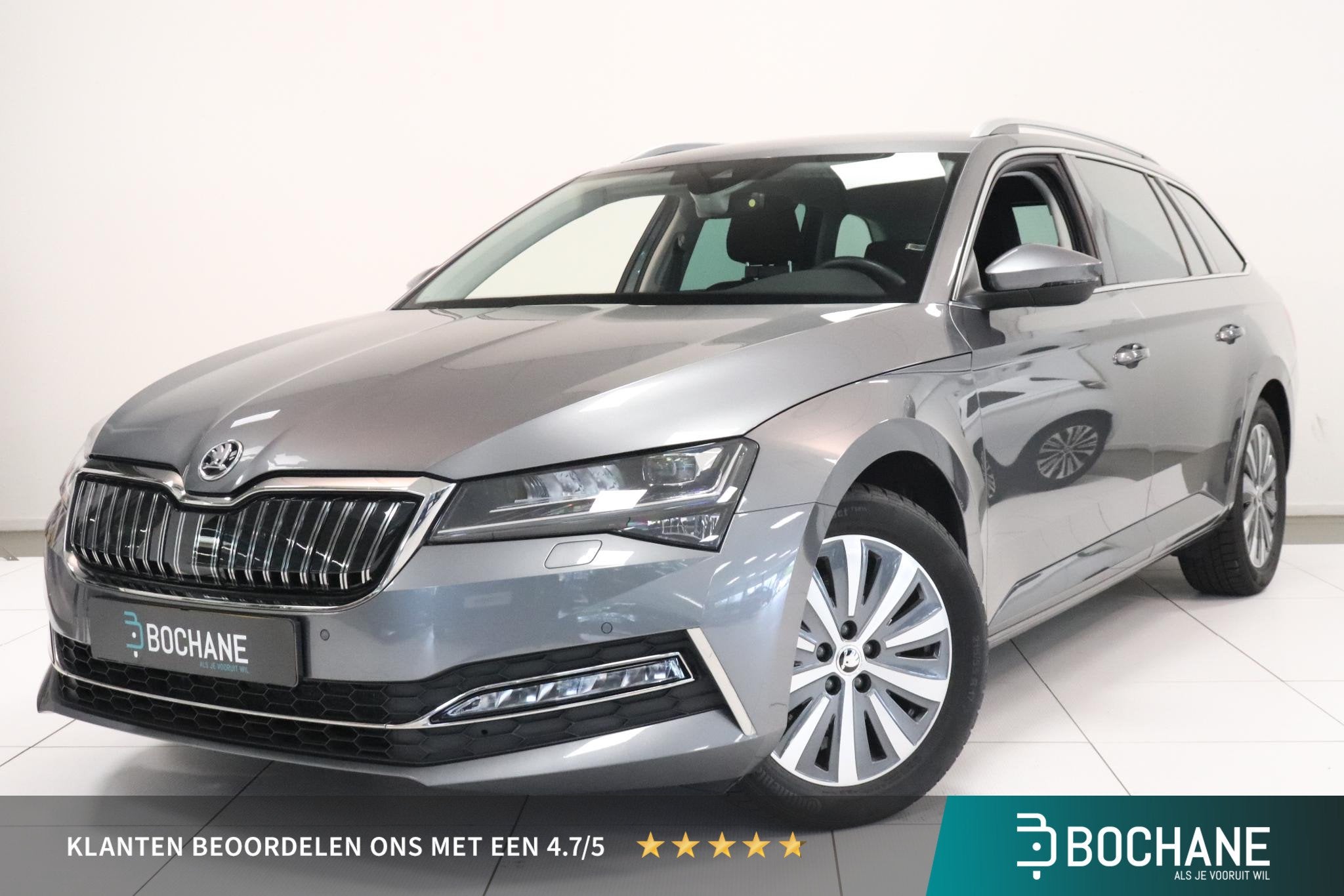 Skoda Superb Combi 1.4 TSI iV Business Edition Plus | Camera, Stof, Gebruikt, 4 cilinders, Met garantie (alle)