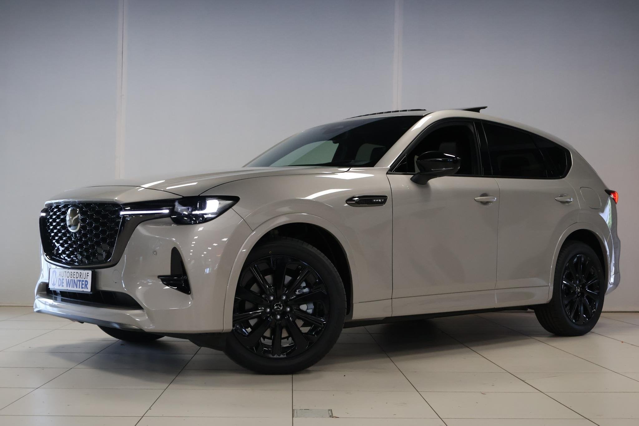 Mazda CX-60 2.5 e-SkyActiv PHEV Homura Plus ., Auto's, Mazda, Automaat, Gebruikt, Zwart, 2500 kg