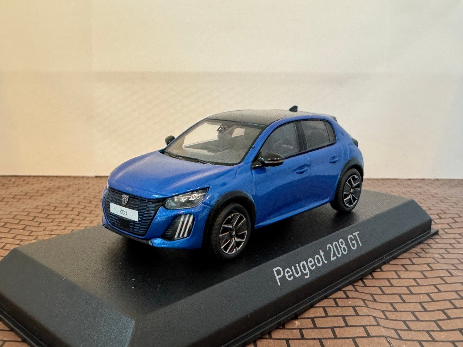 Peugeot 208 GT 2024 Vertigo Blue Norev 1:43, Hobby en Vrije tijd, Ophalen of Verzenden, Zo goed als nieuw, Auto, Norev